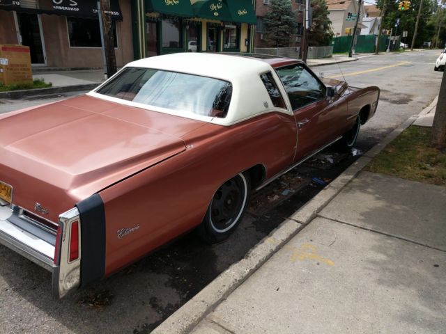 1976 Orange Cadillac Eldorado Coupe