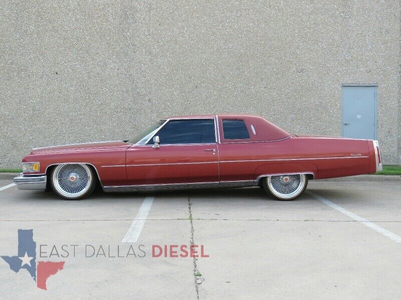 1976 Red Cadillac DeVille Coupe