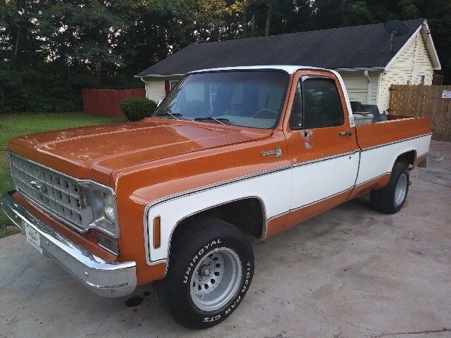 1976 Orange and white Chevrolet C-10 2 door