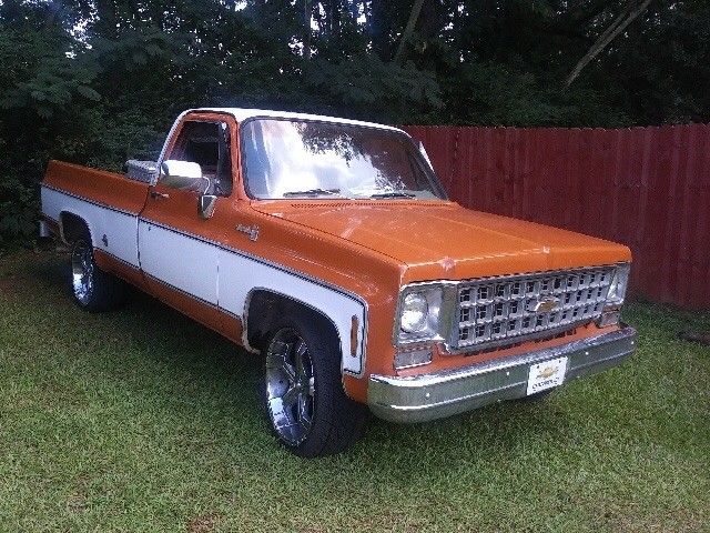 1976 Orange and white Chevrolet C-10 2 door