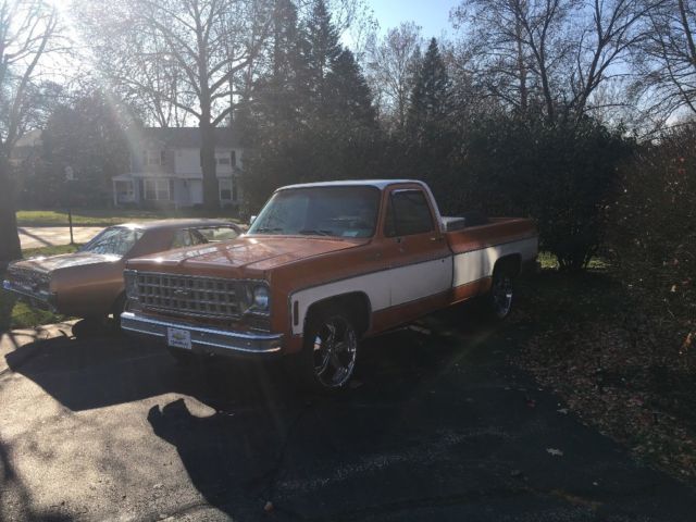 1976 Orange and white Chevrolet C-10 2 door