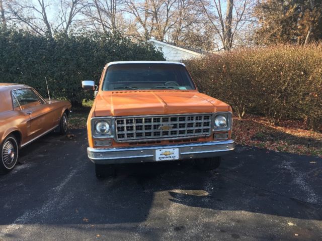 1976 Orange and white Chevrolet C-10 2 door