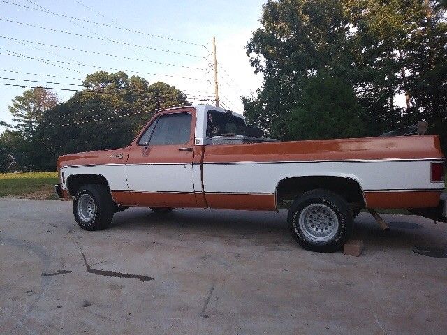 1976 Orange and white Chevrolet C-10 2 door