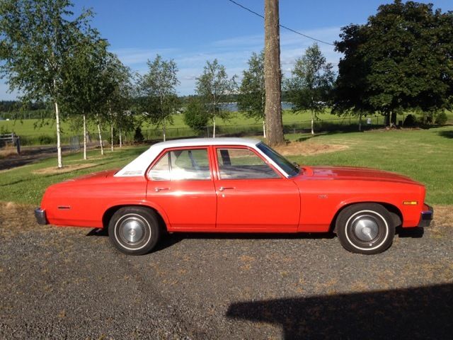 19760000 Orange Chevrolet Nova Sedan