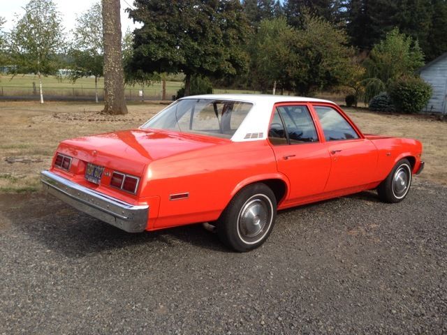 19760000 Orange Chevrolet Nova Sedan
