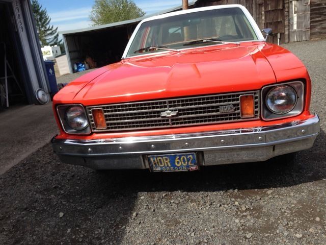 19760000 Orange Chevrolet Nova Sedan