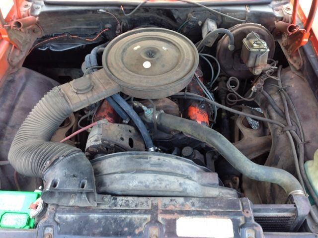 19760000 Orange Chevrolet Nova Sedan