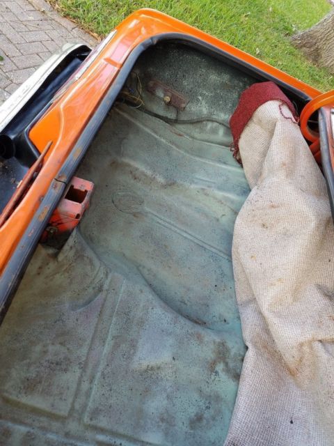 1976 Orange Chevrolet Nova 2 door