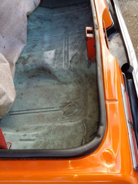 1976 Orange Chevrolet Nova 2 door