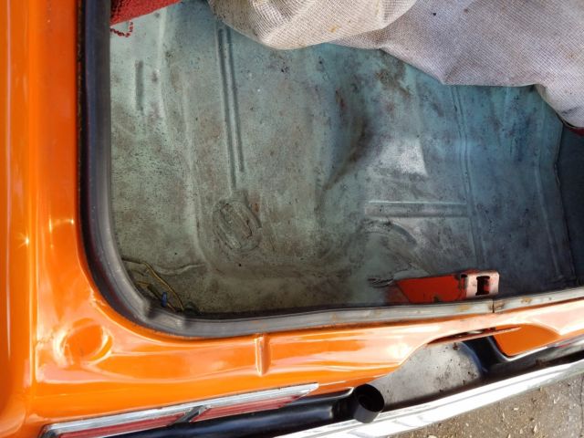 1976 Orange Chevrolet Nova 2 door