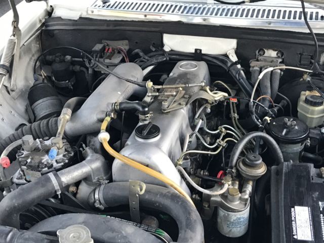 1976 White Mercedes-Benz 300-Series Sedan