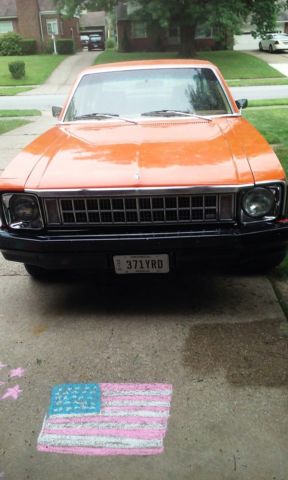 1976 Orange, Gray, & Black Chevrolet Nova Sedan
