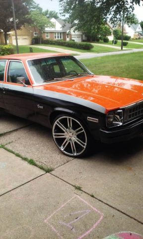 1976 Orange, Gray, & Black Chevrolet Nova Sedan
