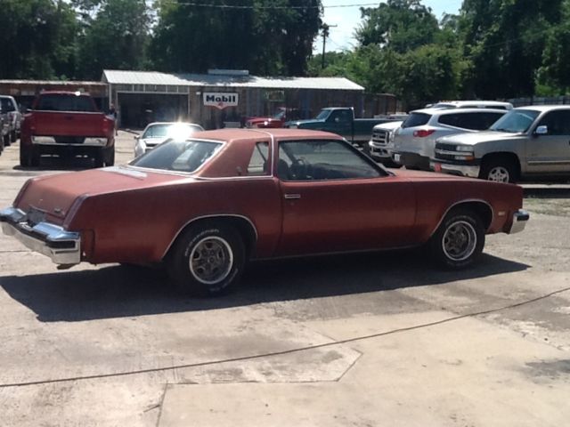 1976 Burgundy Oldsmobile Cutlass Coupe