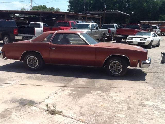 1976 Burgundy Oldsmobile Cutlass Coupe