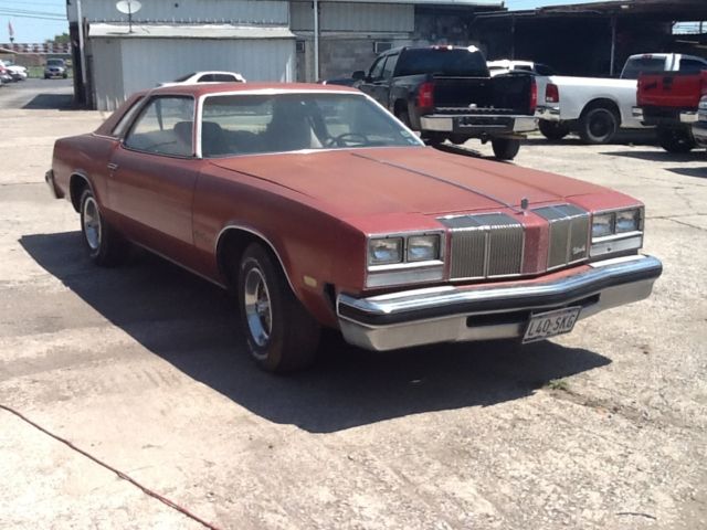 1976 Burgundy Oldsmobile Cutlass Coupe