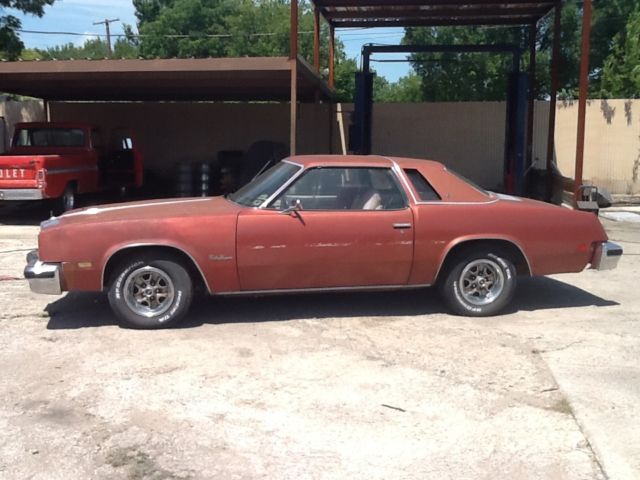 1976 Burgundy Oldsmobile Cutlass Coupe