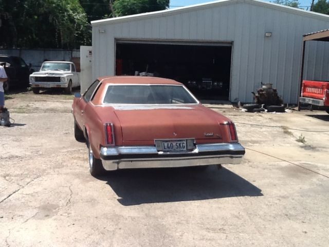 1976 Burgundy Oldsmobile Cutlass Coupe
