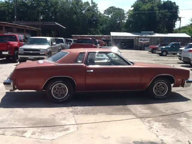 1976 Burgundy Oldsmobile Cutlass Coupe