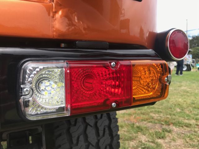 1976  Tricolor atomic orange pearlescent metallic paint Toyota Land Cruiser  Two door hardtop coupe w/ removable shell