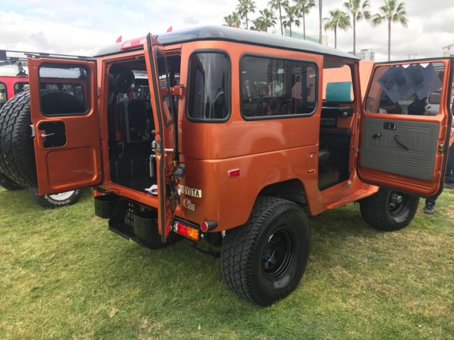 1976  Tricolor atomic orange pearlescent metallic paint Toyota Land Cruiser  Two door hardtop coupe w/ removable shell