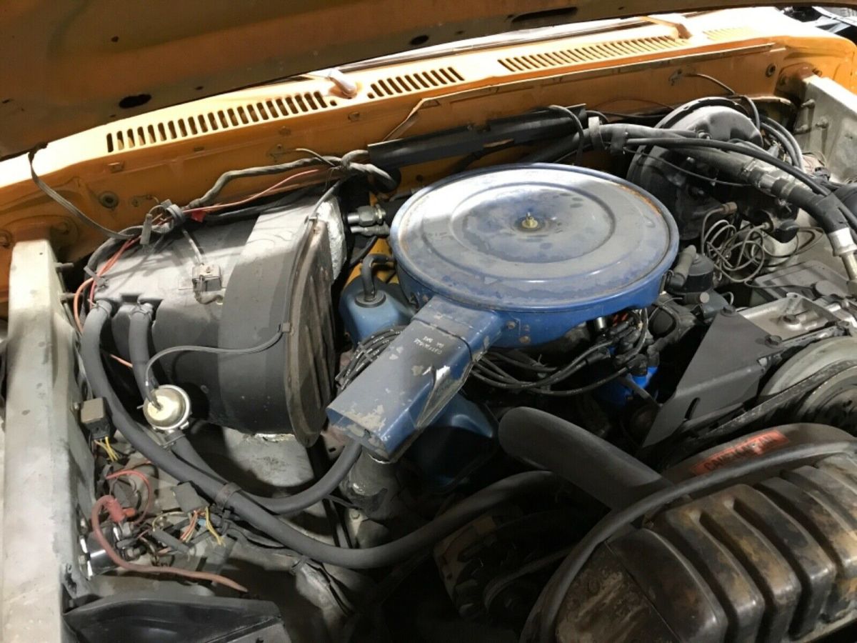 1976 Orange/white Ford F-150 Pick-up