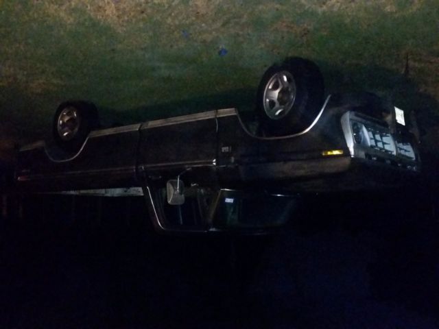 1976 Primer black Ford F-250 Long bed