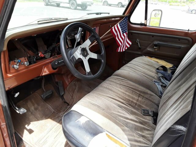 1976 Orange Ford F-250 Standard Cab Pickup