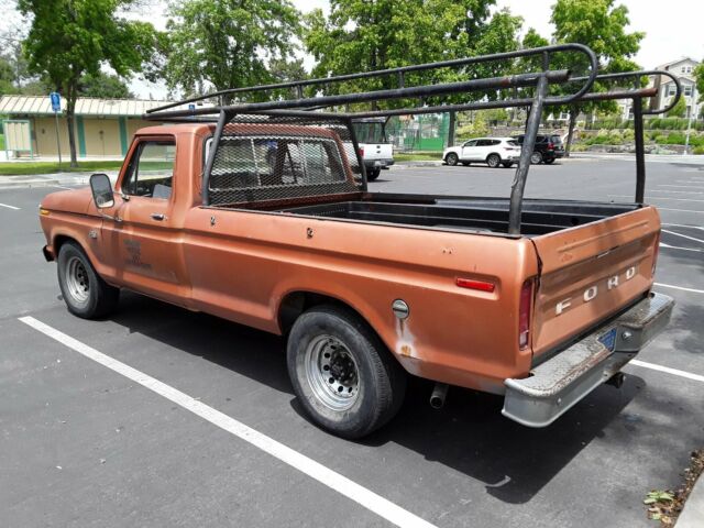 1976 Orange Ford F-250 Standard Cab Pickup