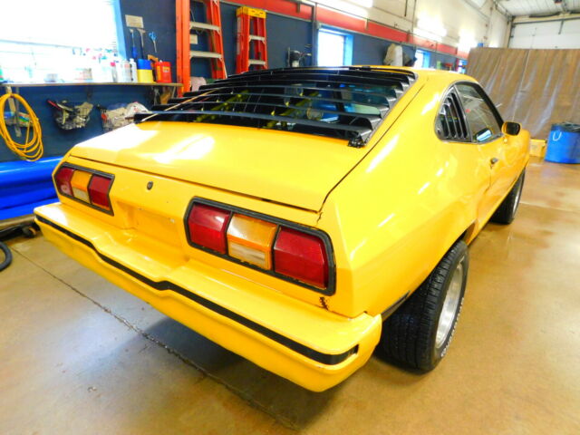 1976 Yellow Ford Mustang Coupe