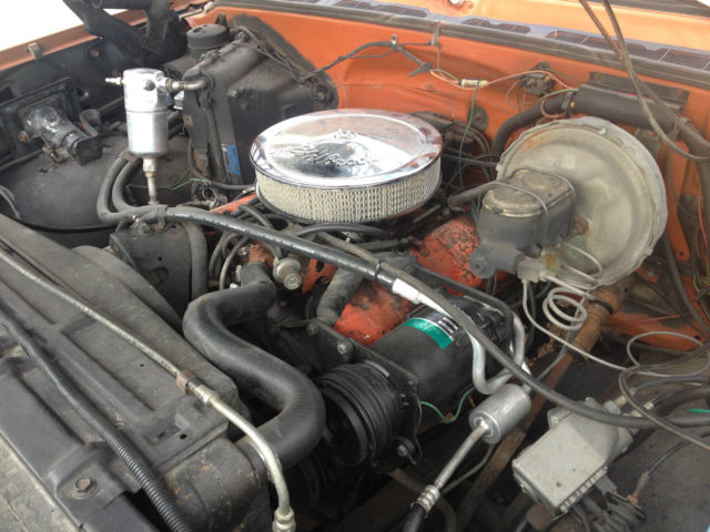 1976 Orange GMC Sierra 2500 Pick Up