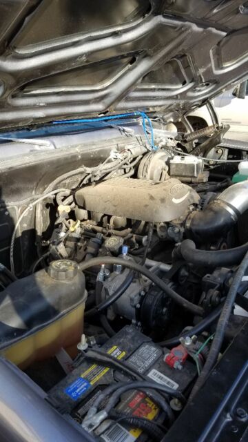 1976 Gunmetal metallic and black (bedliner) Chevrolet Blazer