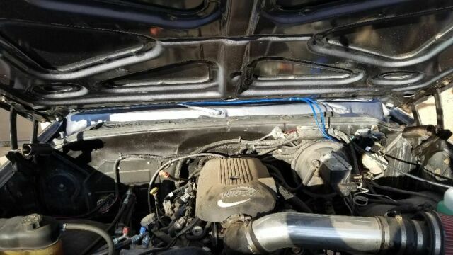 1976 Gunmetal metallic and black (bedliner) Chevrolet Blazer