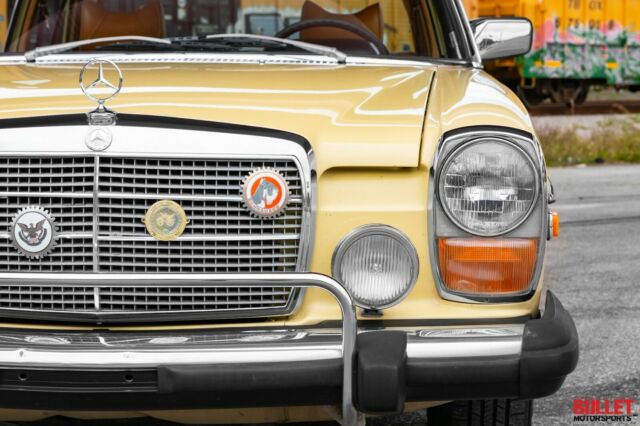 1976 Yellow Mercedes-Benz 300-Series Sedan