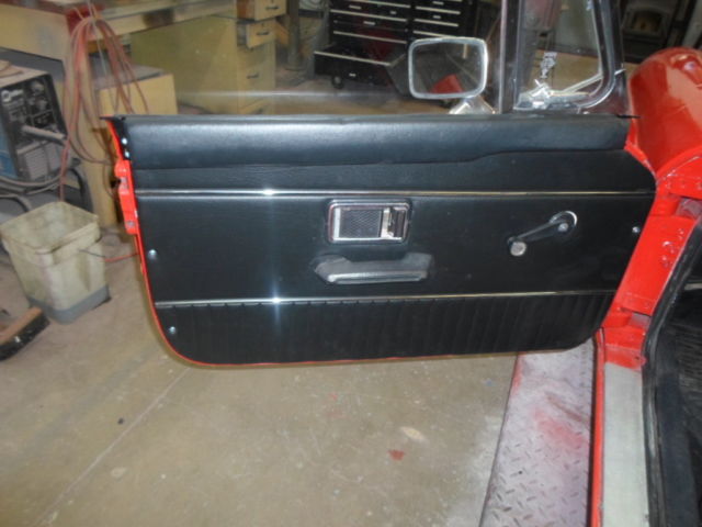 1976 red MG MGB Convertible