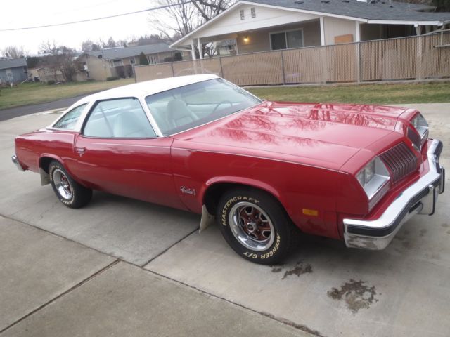 1976 Red Oldsmobile Cutlass Coupe