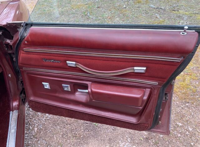 1976 Burgundy Oldsmobile Cutlass Sedan