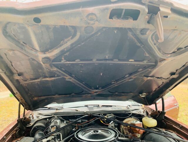 1976 Burgundy Oldsmobile Cutlass Sedan