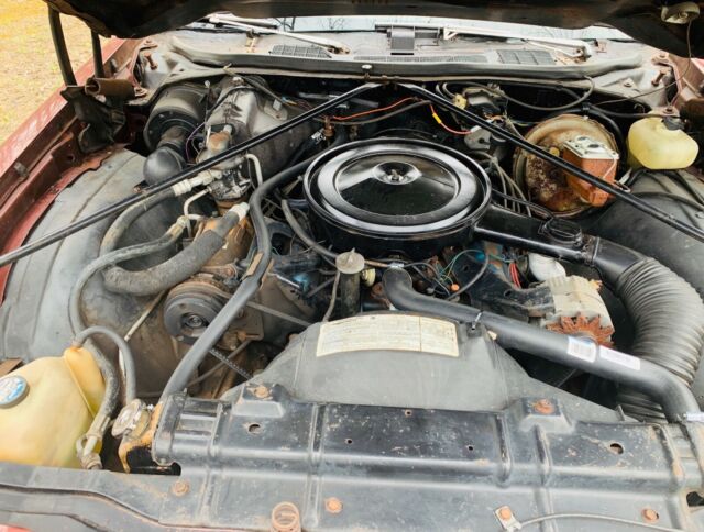 1976 Burgundy Oldsmobile Cutlass Sedan