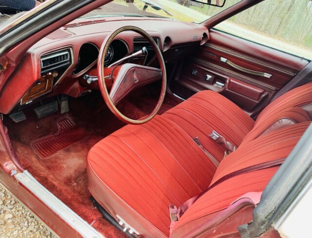 1976 Burgundy Oldsmobile Cutlass Sedan