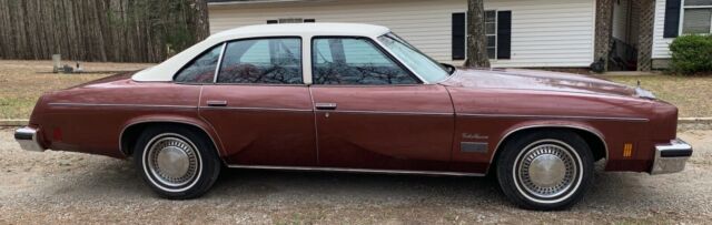 1976 Burgundy Oldsmobile Cutlass Sedan
