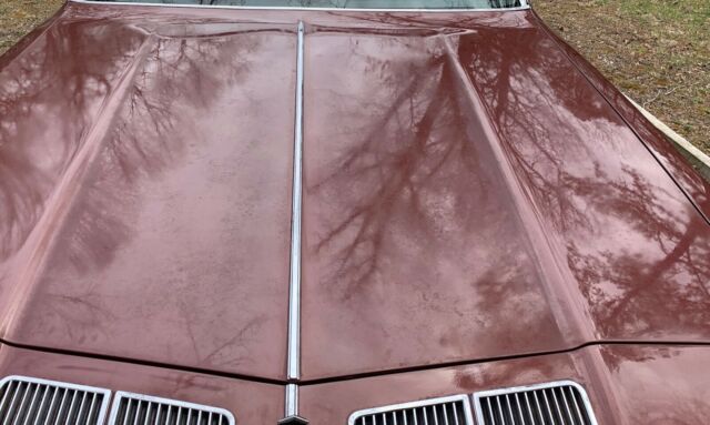 1976 Burgundy Oldsmobile Cutlass Sedan