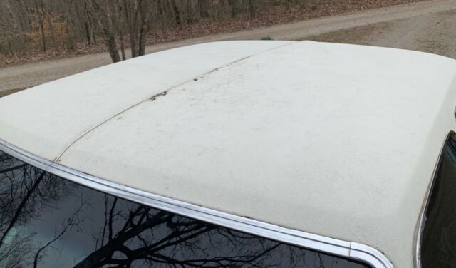 1976 Burgundy Oldsmobile Cutlass Sedan