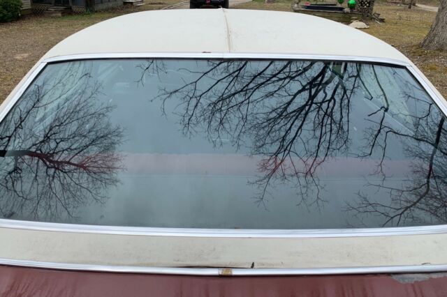 1976 Burgundy Oldsmobile Cutlass Sedan