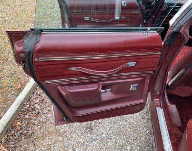 1976 Burgundy Oldsmobile Cutlass Sedan