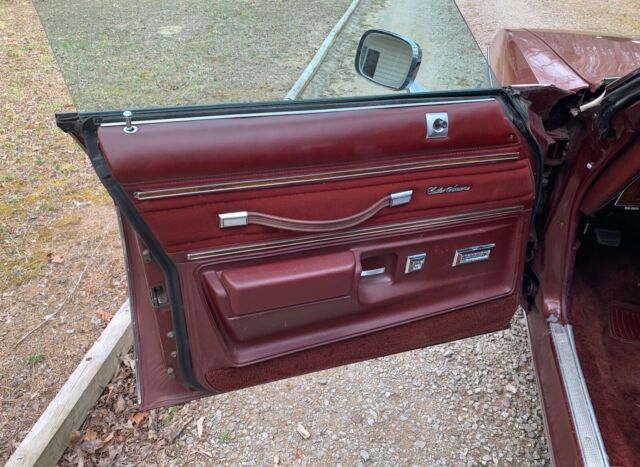1976 Burgundy Oldsmobile Cutlass Sedan