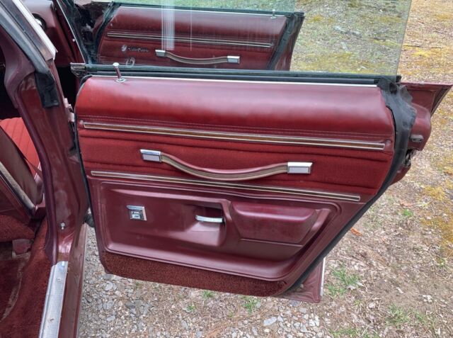 1976 Burgundy Oldsmobile Cutlass Sedan