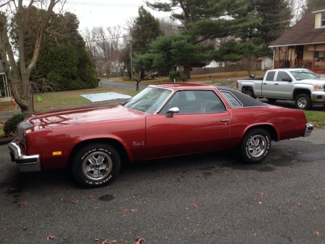 1976 Firethorn red Oldsmobile Cutlass Coupe