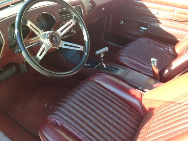 1976 Firethorn red Oldsmobile Cutlass Coupe