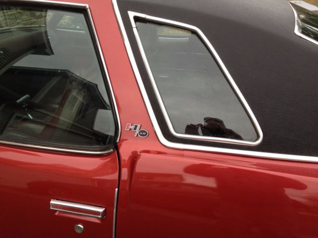 1976 Firethorn red Oldsmobile Cutlass Coupe